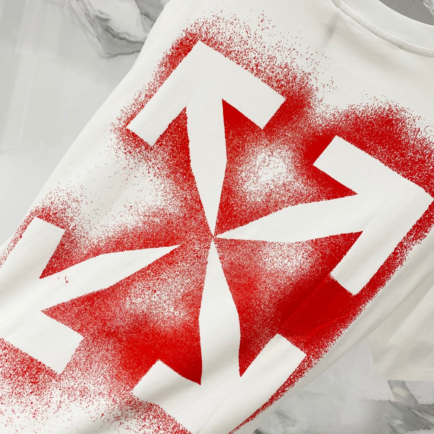Off White off-white T-shirt close-up of large red arrow graphic