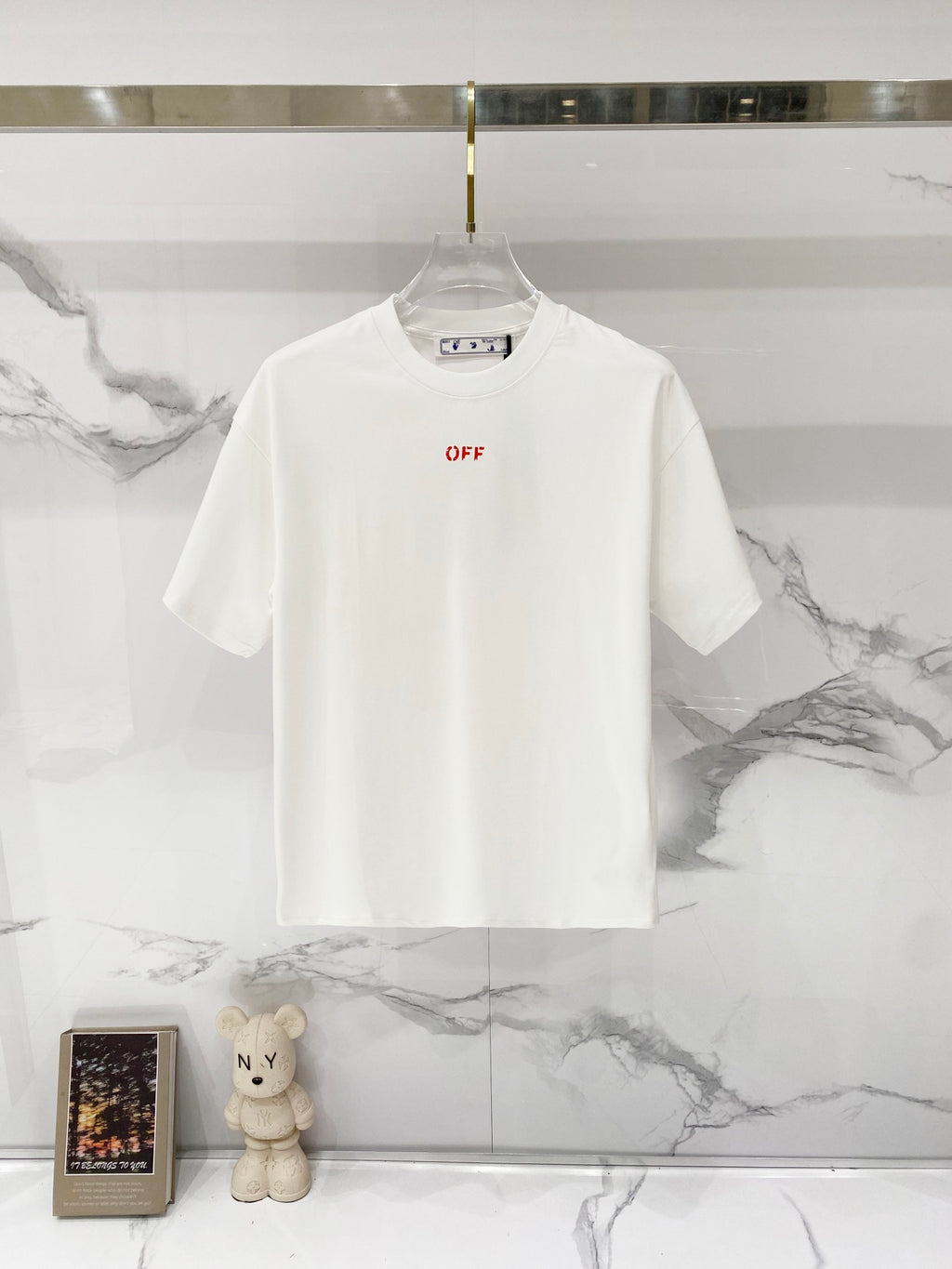 Off White off-white T-shirt with small red 'OFF' chest graphic