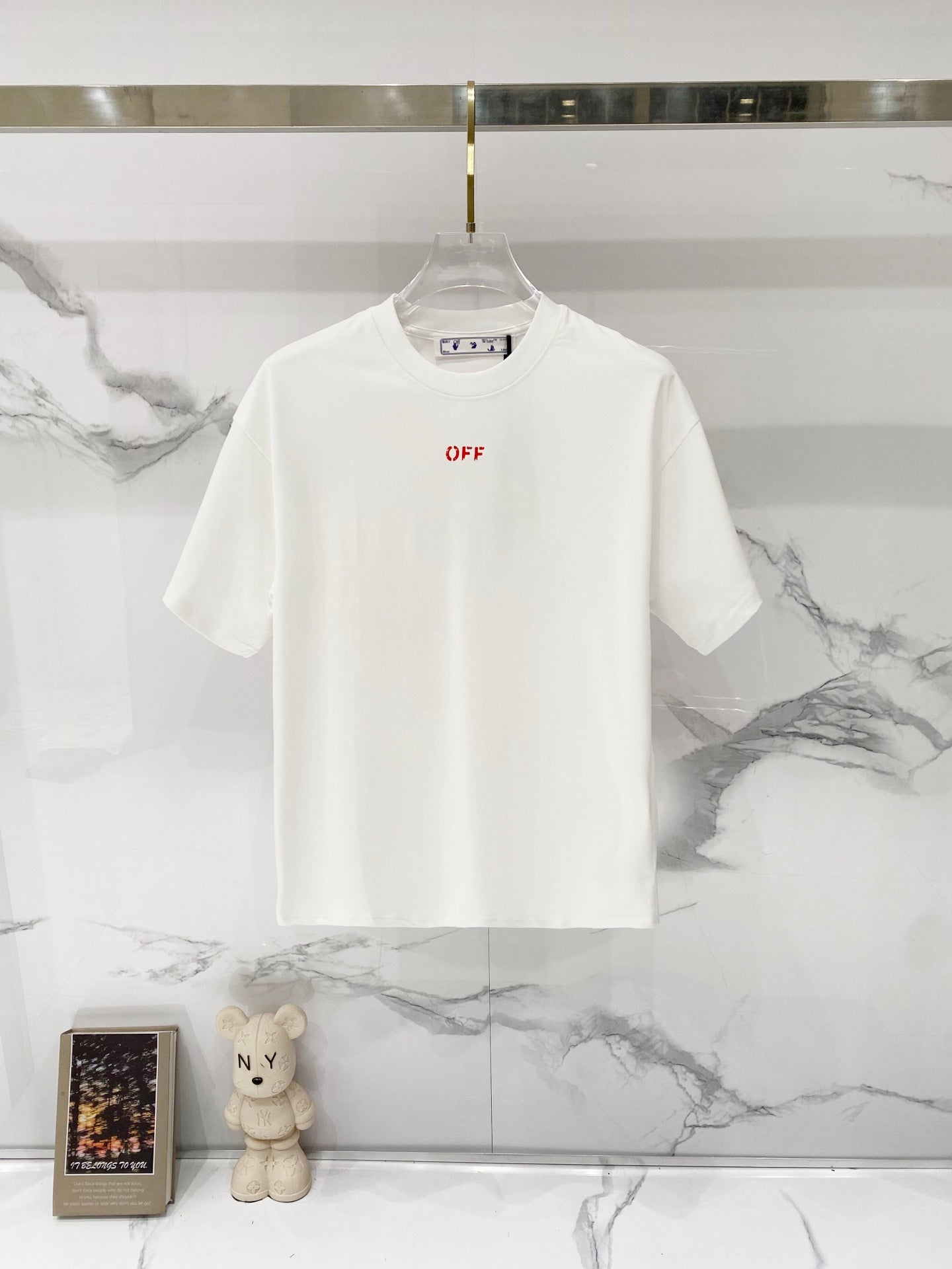 Off White off-white T-shirt with small red 'OFF' chest graphic