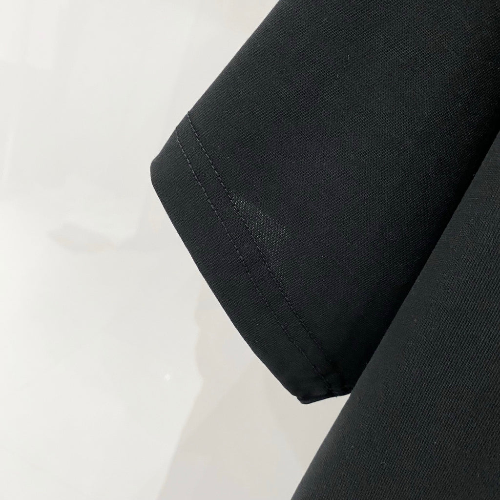 Off White T-shirt, black sleeve hem and stitching close-up