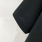 Off White T-shirt, black sleeve hem and stitching close-up