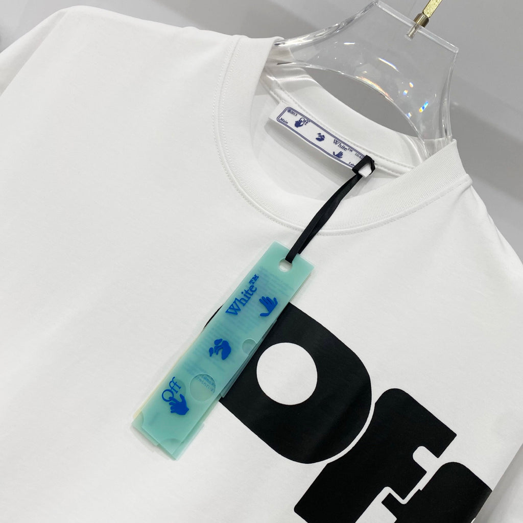 Off White T-shirt close-up of neck and black logo graphic with tag