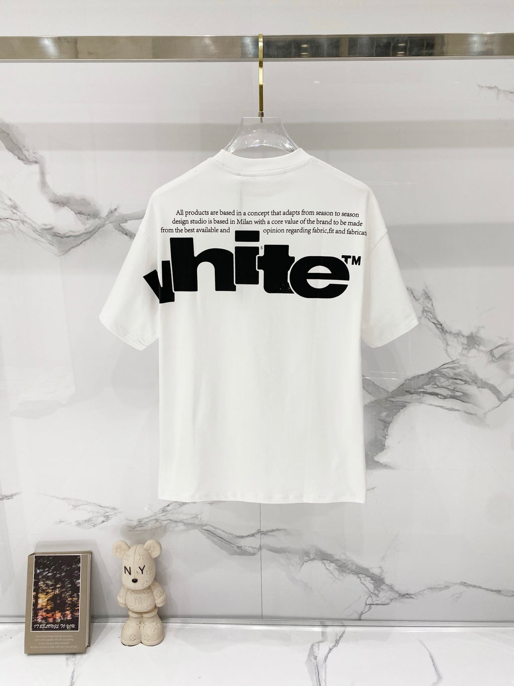 Off White T-shirt with large black "white" logo print on back