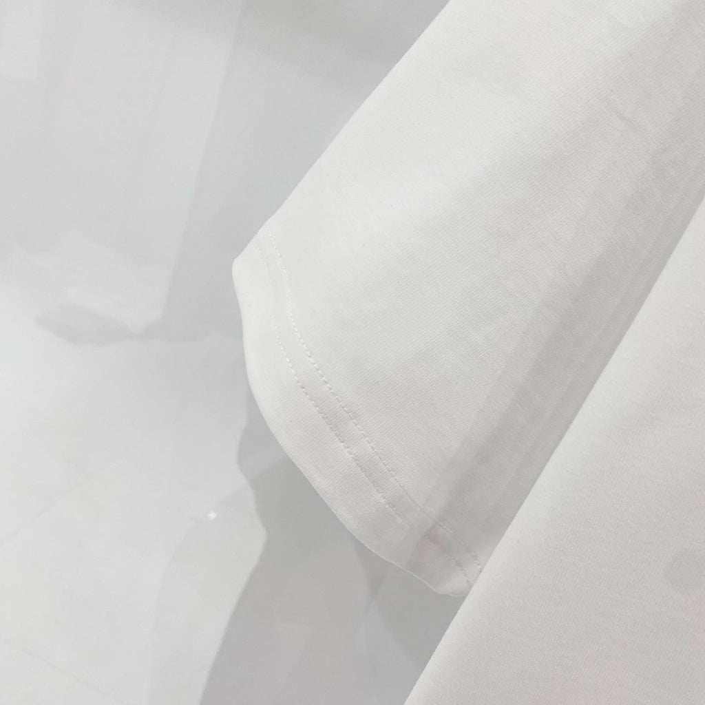 Off White T-shirt sleeve and hem stitching detail