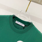 Off-White T-shirt neckline close-up, dark green knit and printed inner label.