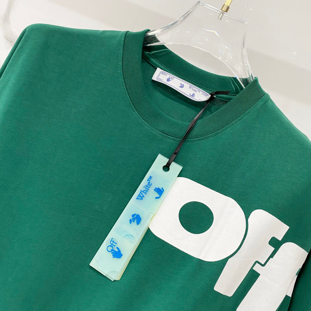 Off-White T-shirt, dark green with large white 'OF' graphic and hanging size tag.