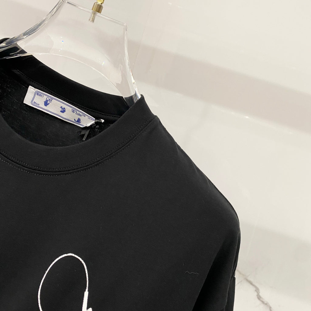 Black T-shirt with crew neck and partial white outline icon