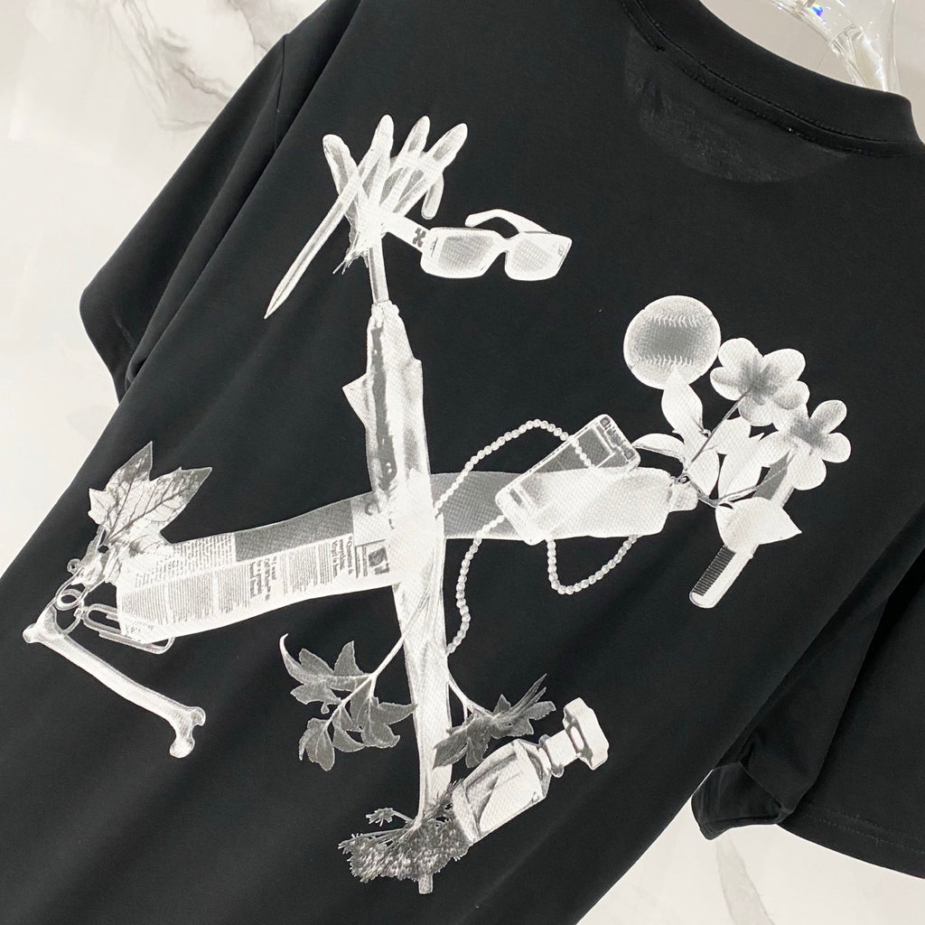 Black T-shirt with large white floral key-like graphic print