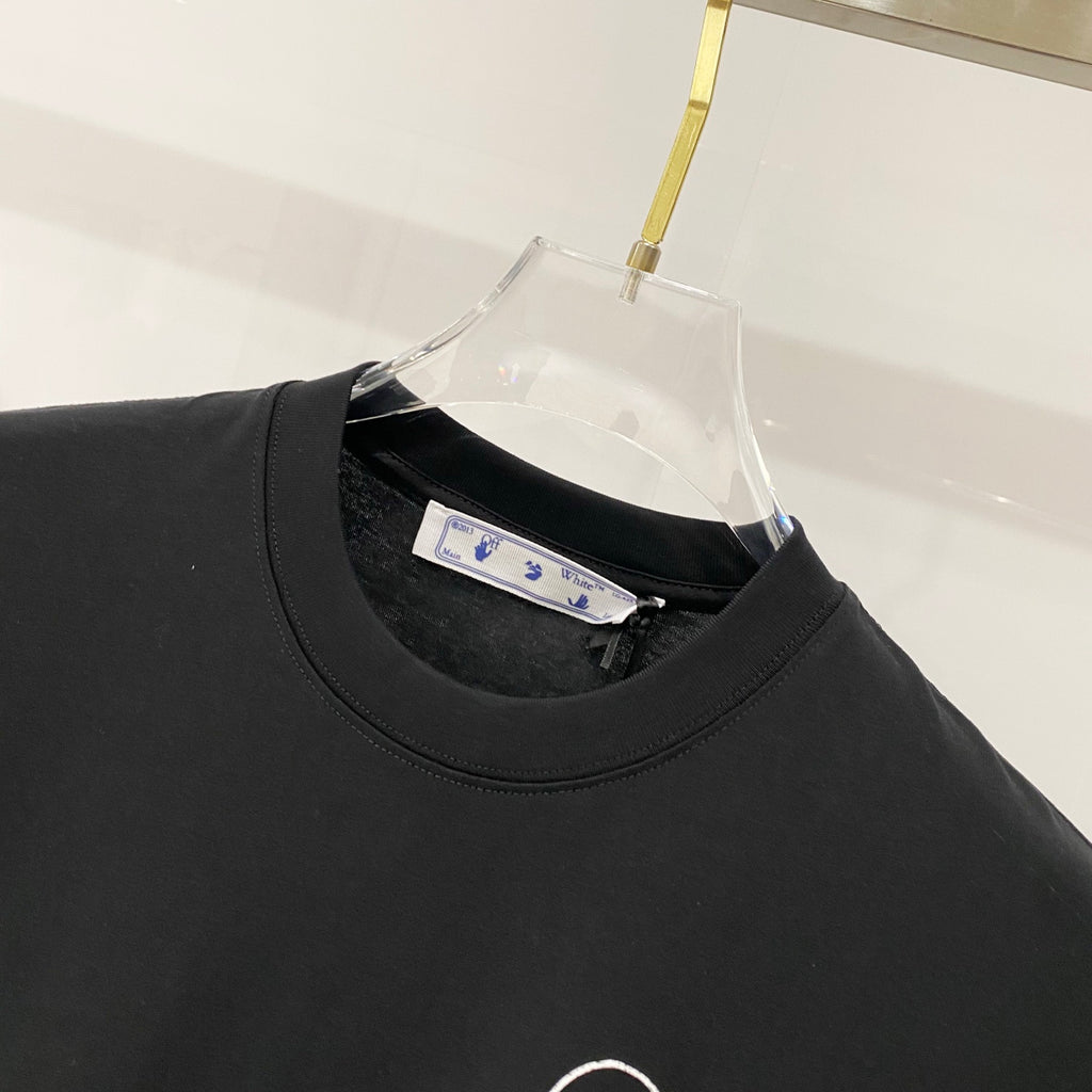 Black T-shirt crew neckline with inner label