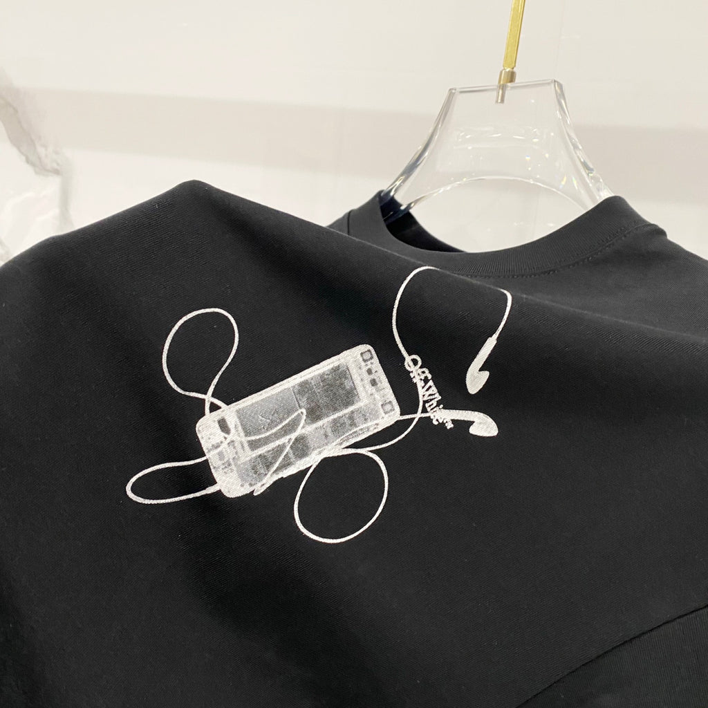 Black T-shirt with white outline music-style graphic on the chest