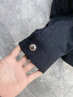 Louis Vuitton long jacket sleeve with gold snap and round button detail