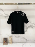 Burberry logo T-shirt, black crewneck with small horse-and-text graphic on the front.