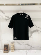 Burberry logo T-shirt, black crewneck with small horse-and-text graphic on the front.