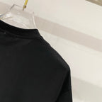Burberry black crewneck T-shirt shoulder and upper back seam close-up, short sleeves.