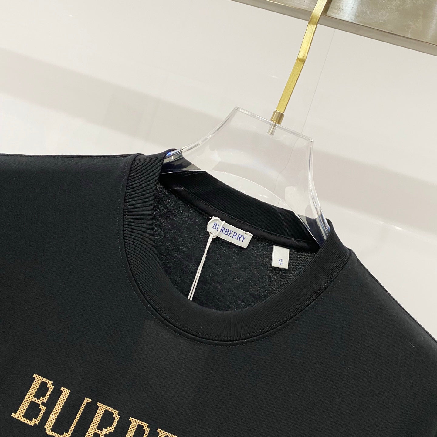Black short-sleeve T-shirt neckline with Burberry size tag