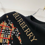 Black short-sleeve T-shirt with Burberry gold lettering detail