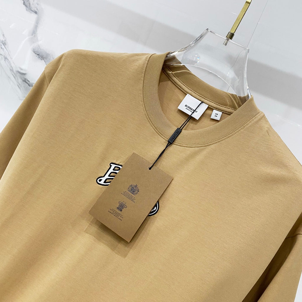 Tan crewneck T-shirt with hang tag and inner neck label