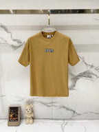Tan short-sleeve T-shirt with Burberry logo on the chest