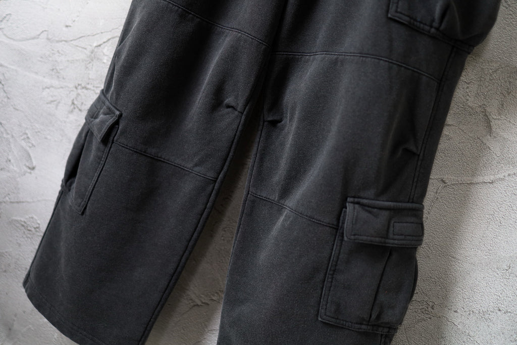 Balenciaga cargo pants leg with stitched cargo pocket panels and side flap pocket