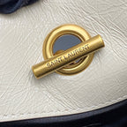 Gold clasp hardware engraved with SAINT LAUREN T on white leather