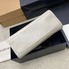 White leather clutch bag with gold chain strap and smooth textured body
