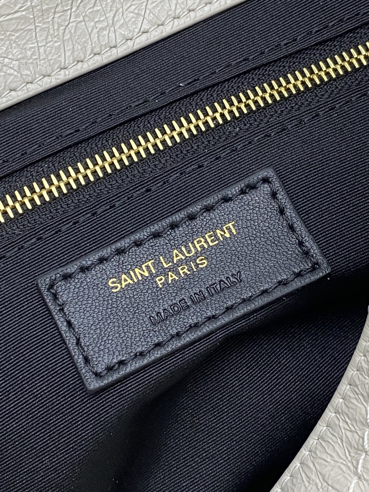 Black interior label reading SAINT LAURENT PARIS, MADE IN ITALY