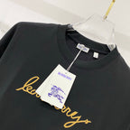 Black crewneck T-shirt with Burberry tag and gold script logo