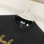 Black crewneck T-shirt neckline with Burberry label on inner collar
