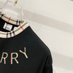 Burberry black short-sleeve T-shirt shoulder with partial BURBERRY lettering