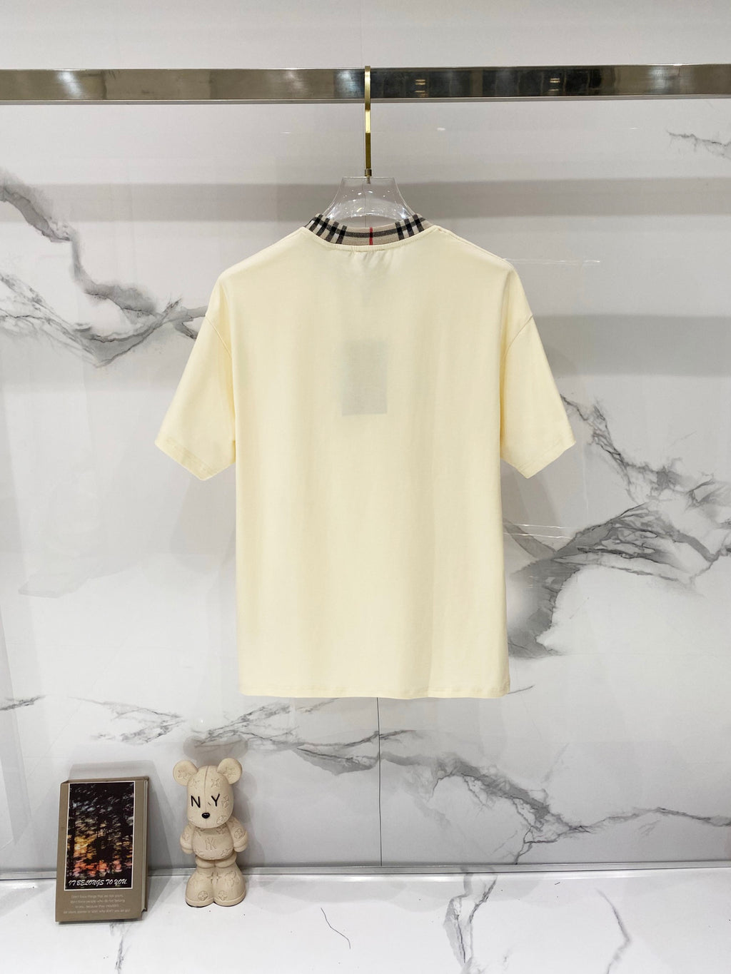 Burberry short-sleeve T-shirt in pale cream with plaid-trim crew neck, rear view