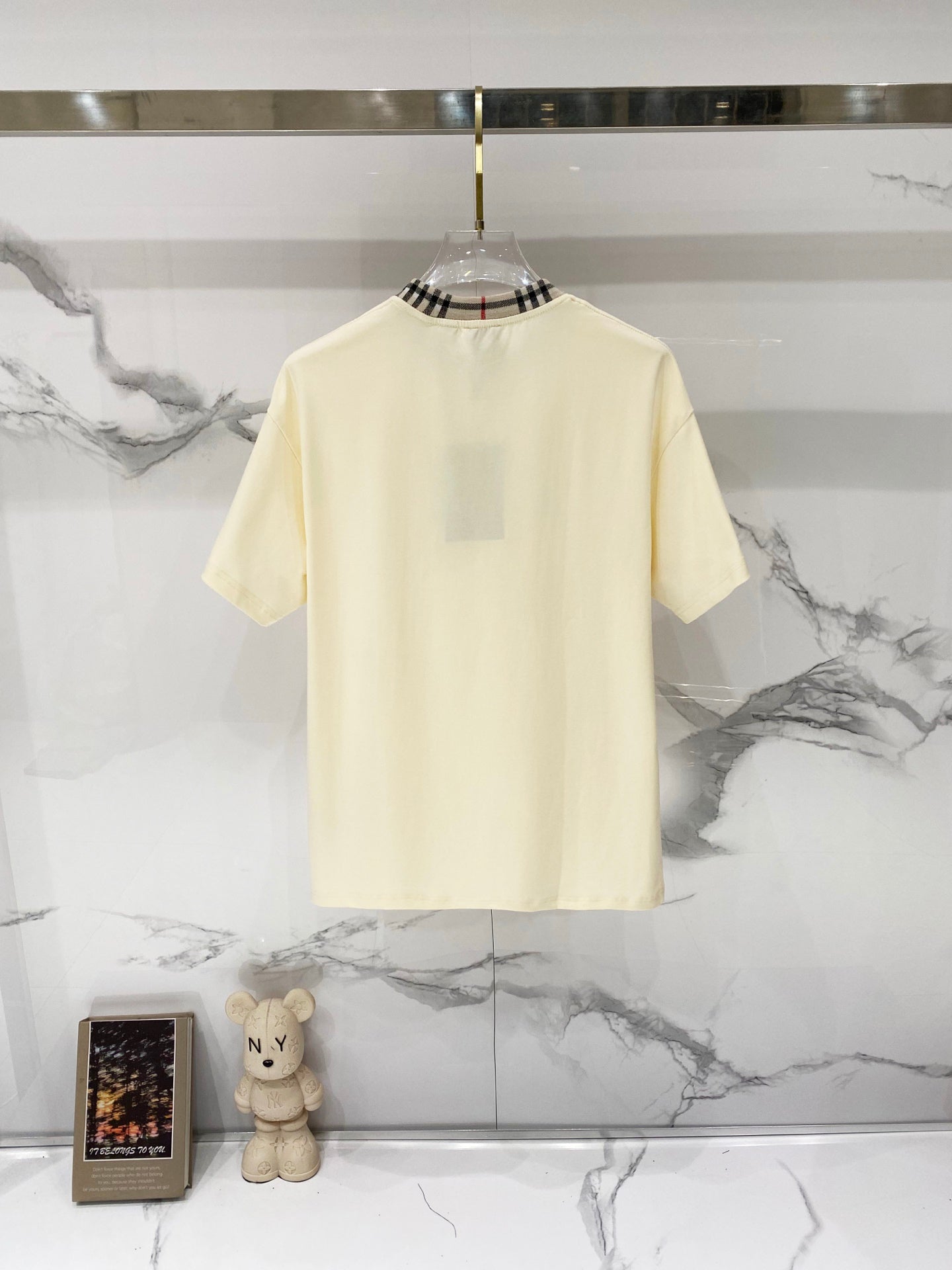 Burberry short-sleeve T-shirt in pale cream with plaid-trim crew neck, rear view