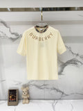 Burberry short-sleeve T-shirt in pale cream with plaid-trim crew neck and BURBERRY print