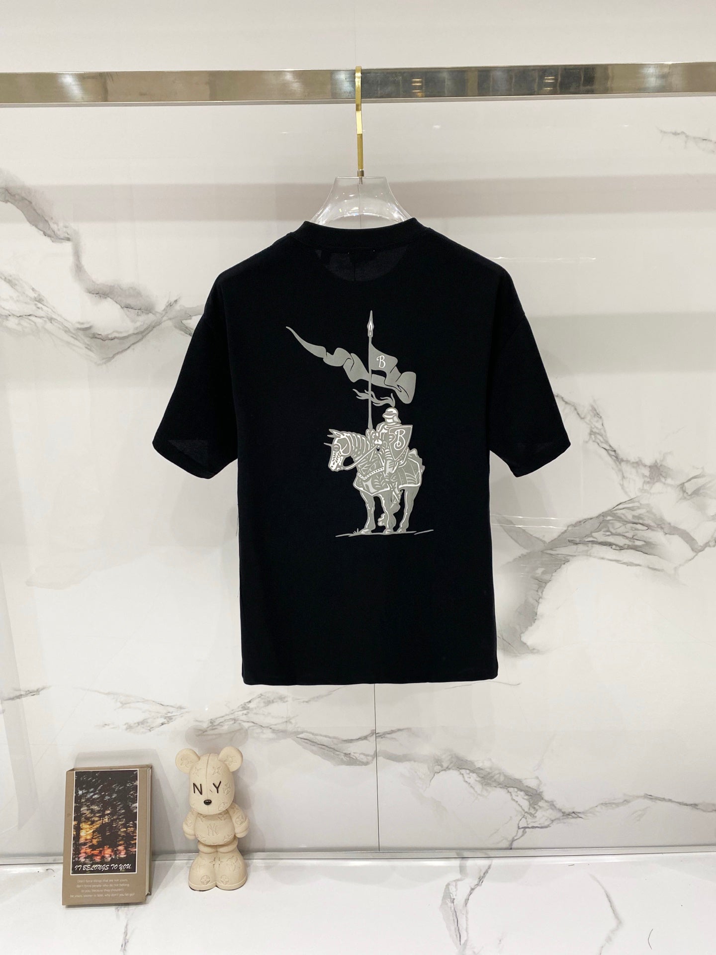 Black short-sleeve T-shirt with large rear graphic print