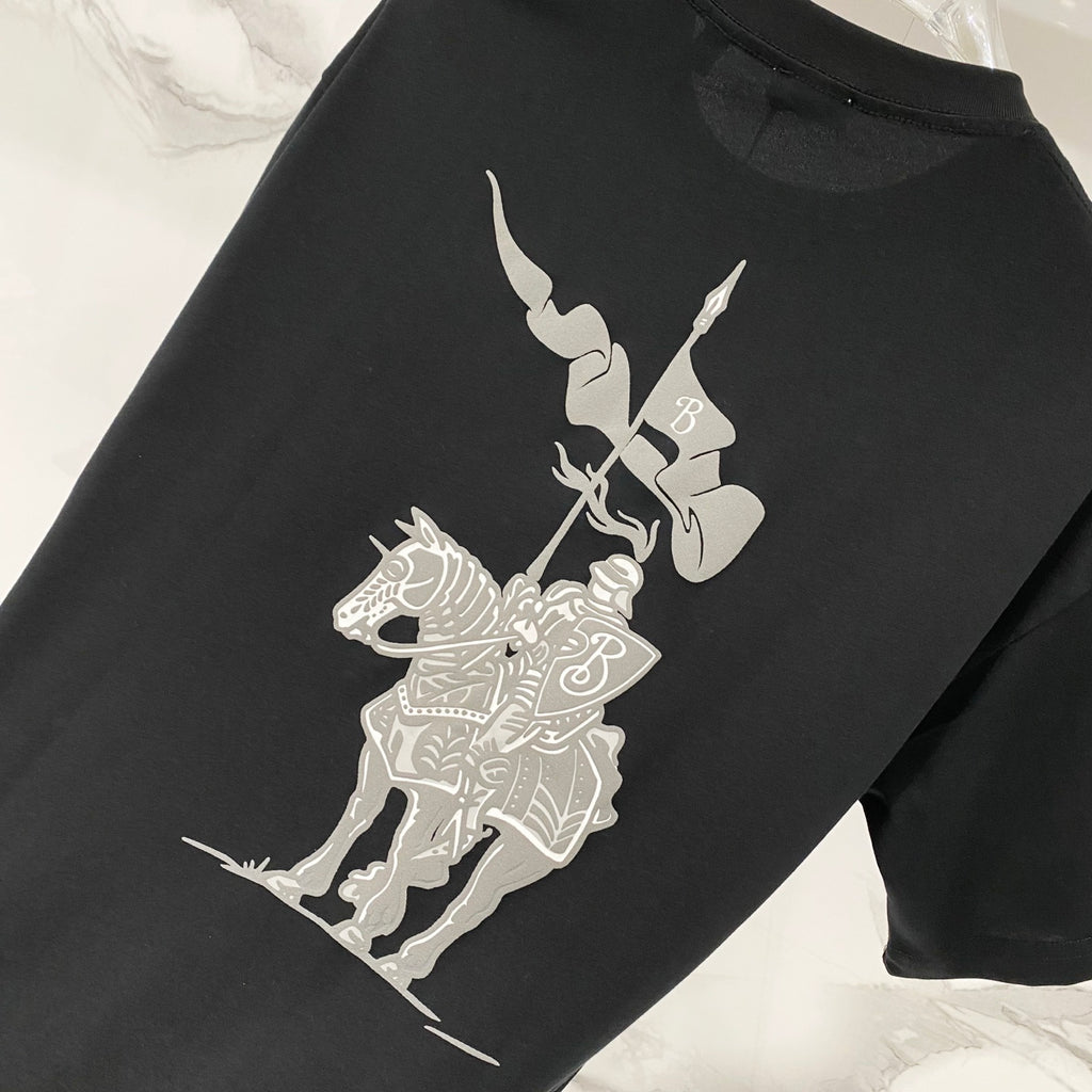 Black T-shirt with large white cartoon-style graphic