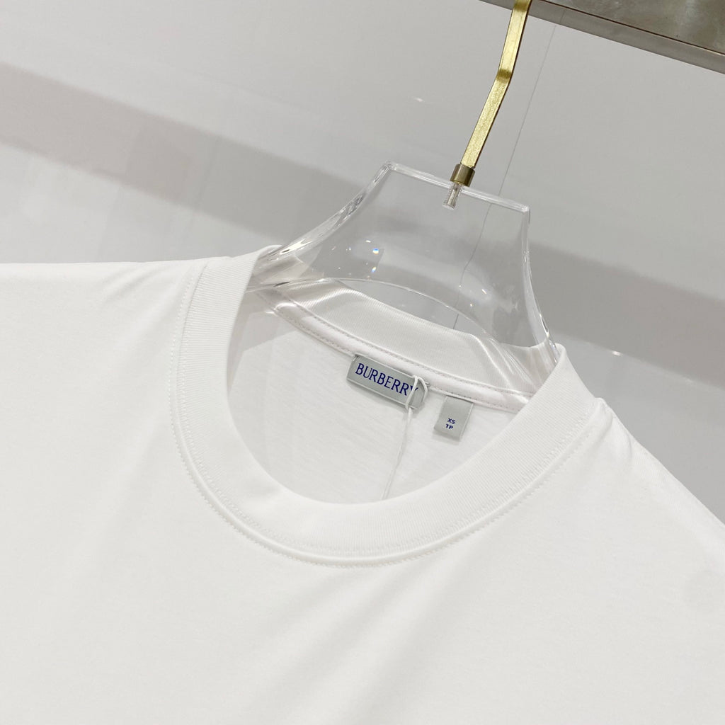 White Burberry T-shirt neckline with inner brand and size label.