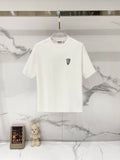 White Burberry short-sleeve T-shirt on hanger, small chest logo.