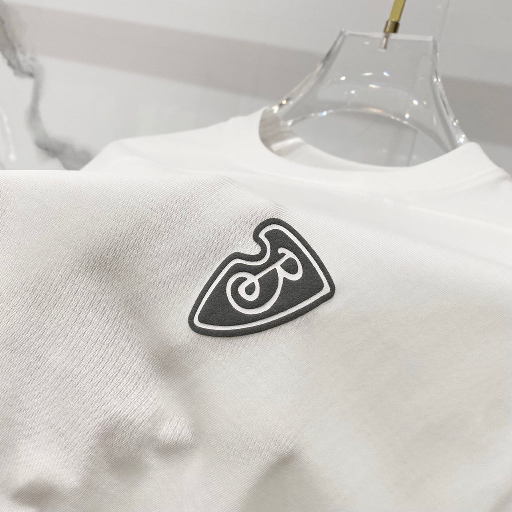White Burberry T-shirt with black heart B logo print on front.