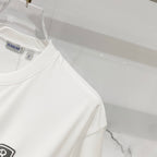 White Burberry short-sleeve T-shirt, crew neck and side seam details.