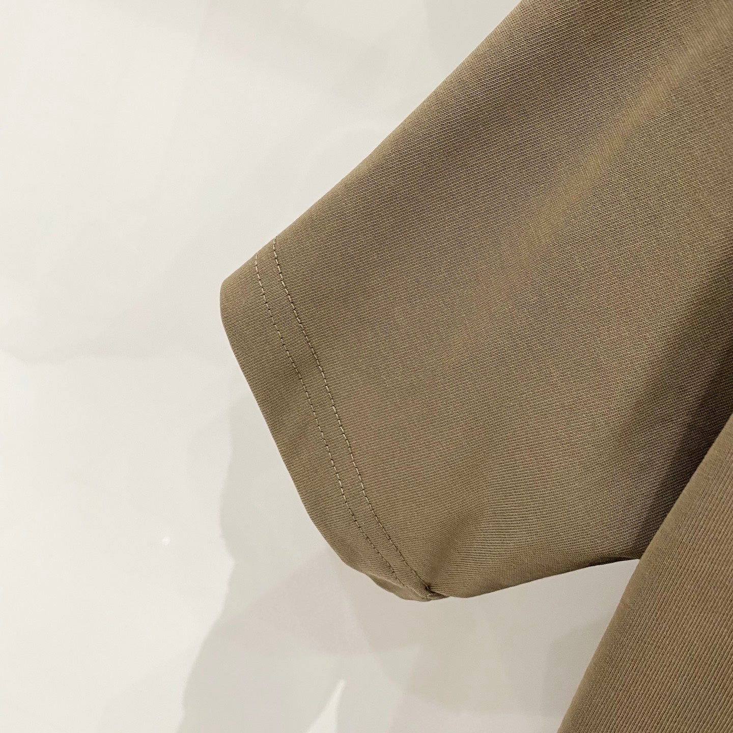 Burberry olive T-shirt sleeve hem with stitched cuff detail