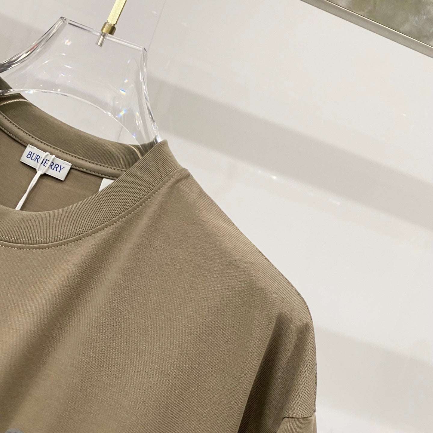 Burberry olive short-sleeve T-shirt side view with shoulder seam