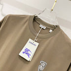 Burberry olive T-shirt close-up with neck tag and small front logo