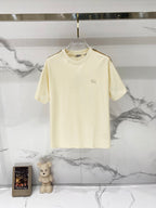 Cream short-sleeve T-shirt with small horse logo on chest