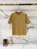 Mustard short-sleeve crewneck T-shirt on a clear hanger, smooth plain front