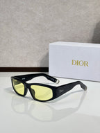 Dior sunglasses with black frame and yellow-green lenses