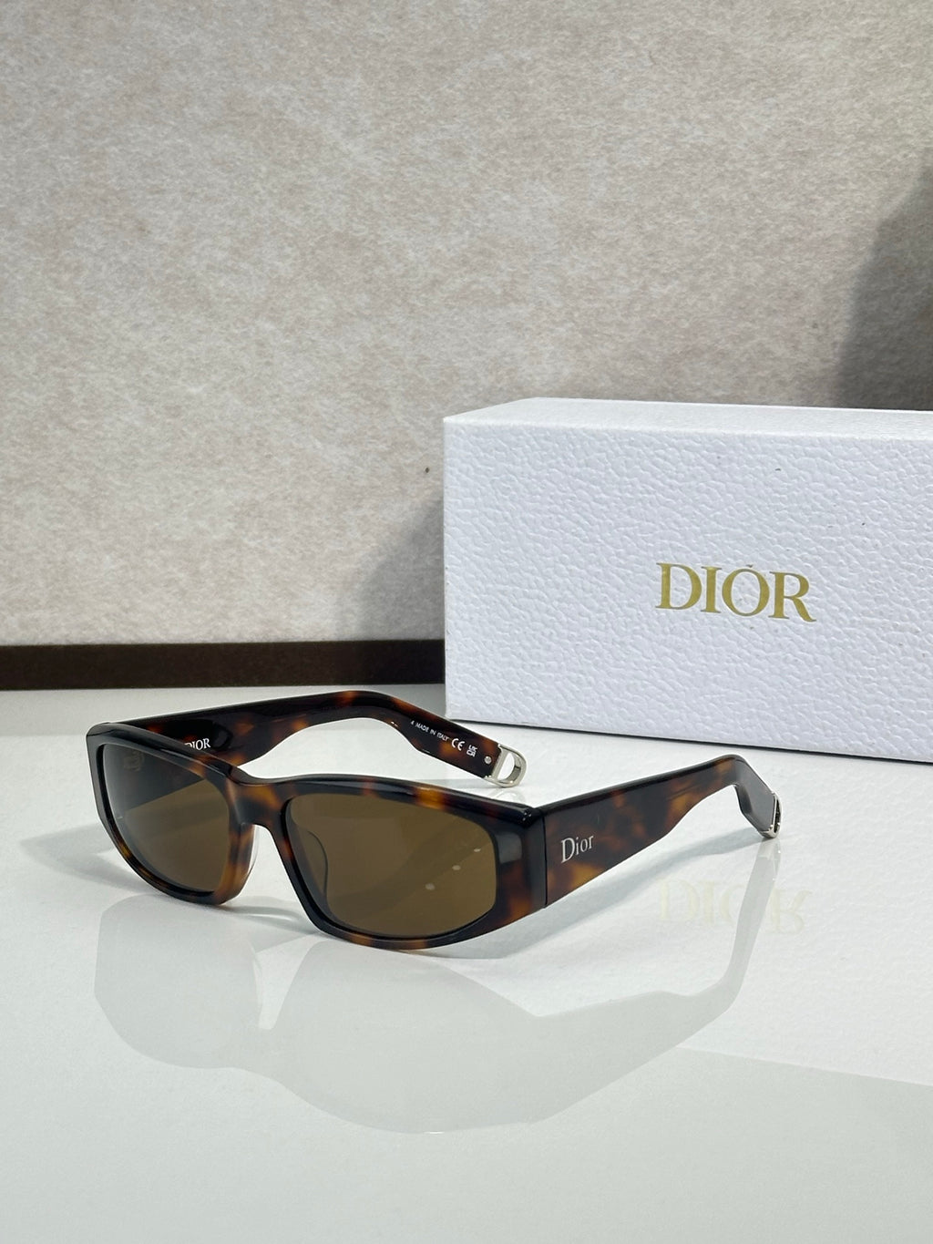 Dior sunglasses with tortoiseshell frame and brown lenses