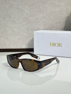 Dior sunglasses with tortoiseshell frame and brown lenses