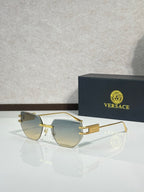 Versace eyeglasses with blue tinted lenses and gold-tone metal frame, rectangular shape