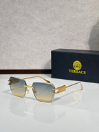 Versace sunglasses with gold frame and pale gold tinted lenses
