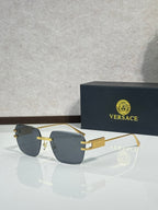 Versace sunglasses, gold frame with blue gradient tinted lenses