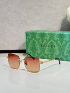 Gucci sunglasses with rose gradient lenses and gold-tone frame, round shape